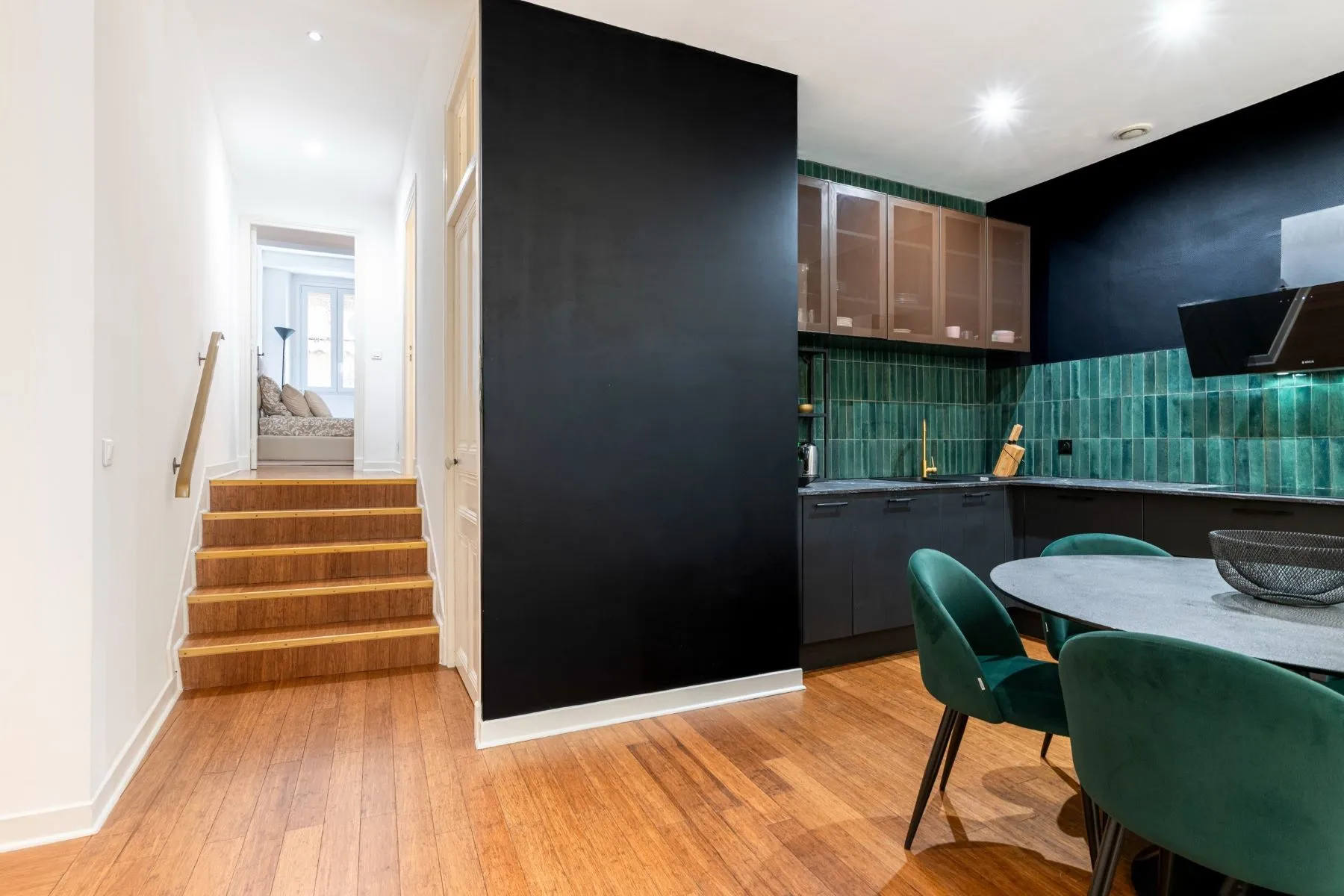 Short internal staircase leading from the kitchen and dining area towards the bedrooms