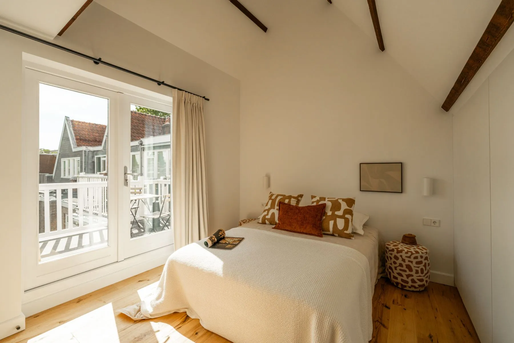 Principal bedroom opening directly onto its private sunny terrace