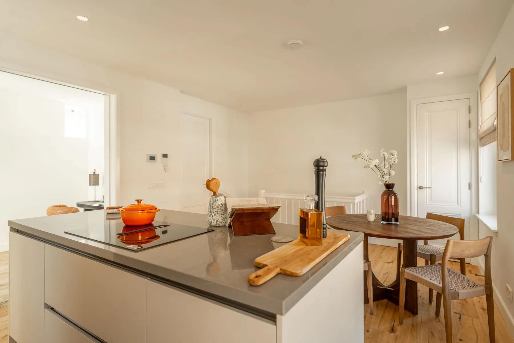 Contemporary kitchen island arranged for relaxed everyday dining