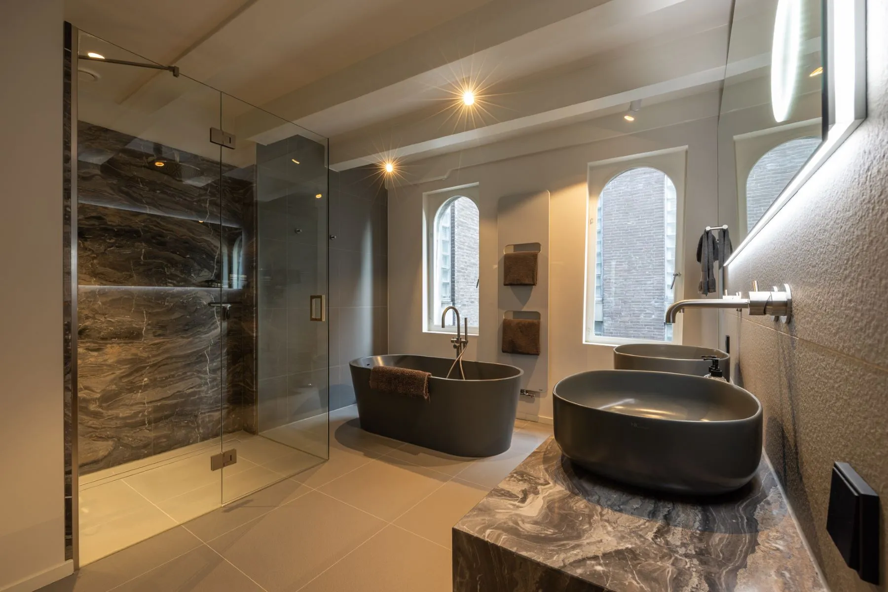 Principal bathroom with freestanding tub and glass walk-in shower