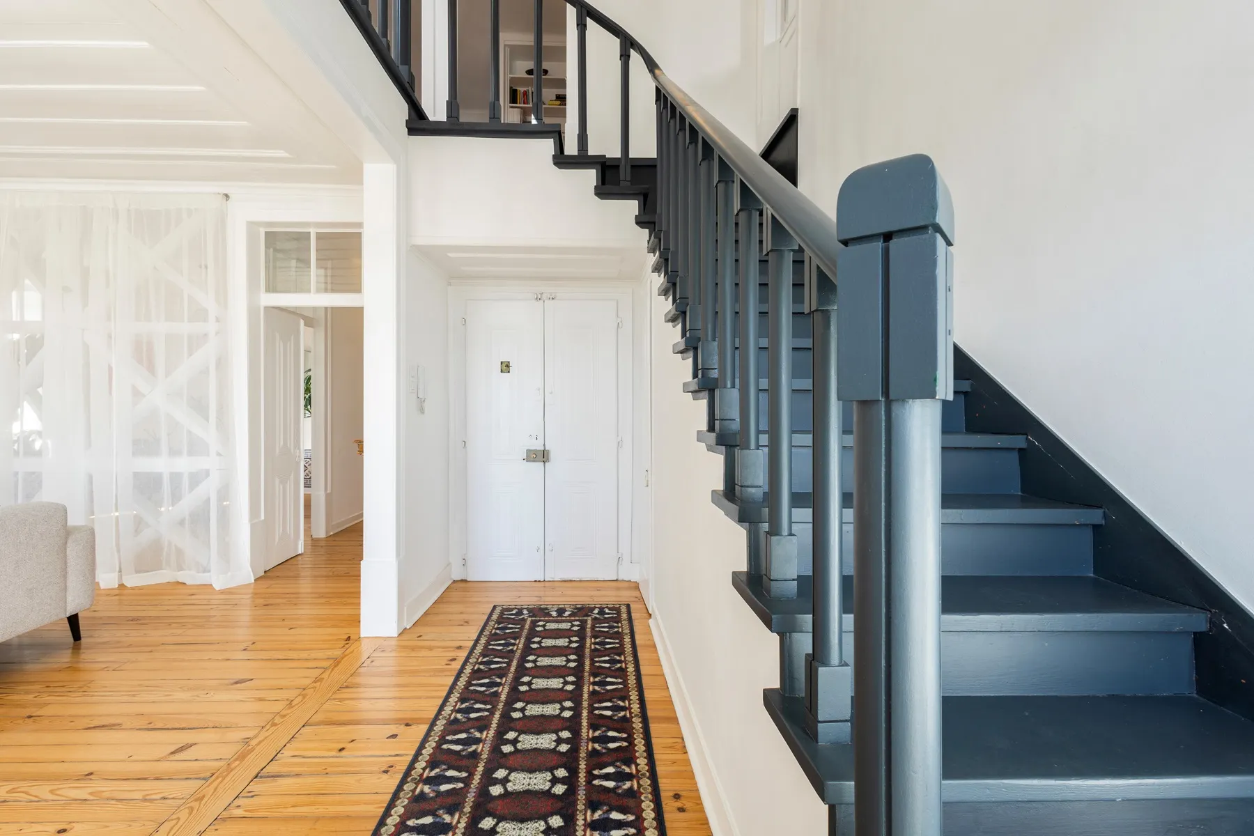 Private staircase connecting the three levels of the Lisbon residence