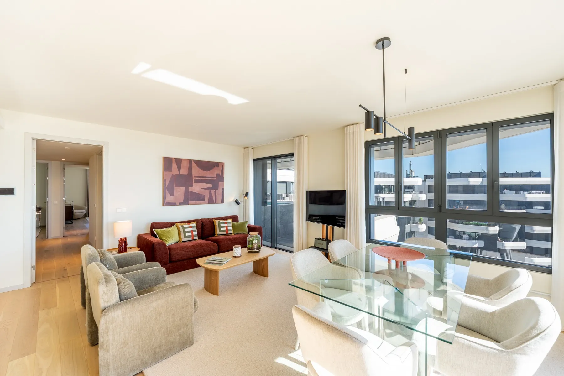 Spacious open-plan reception room with terrace access