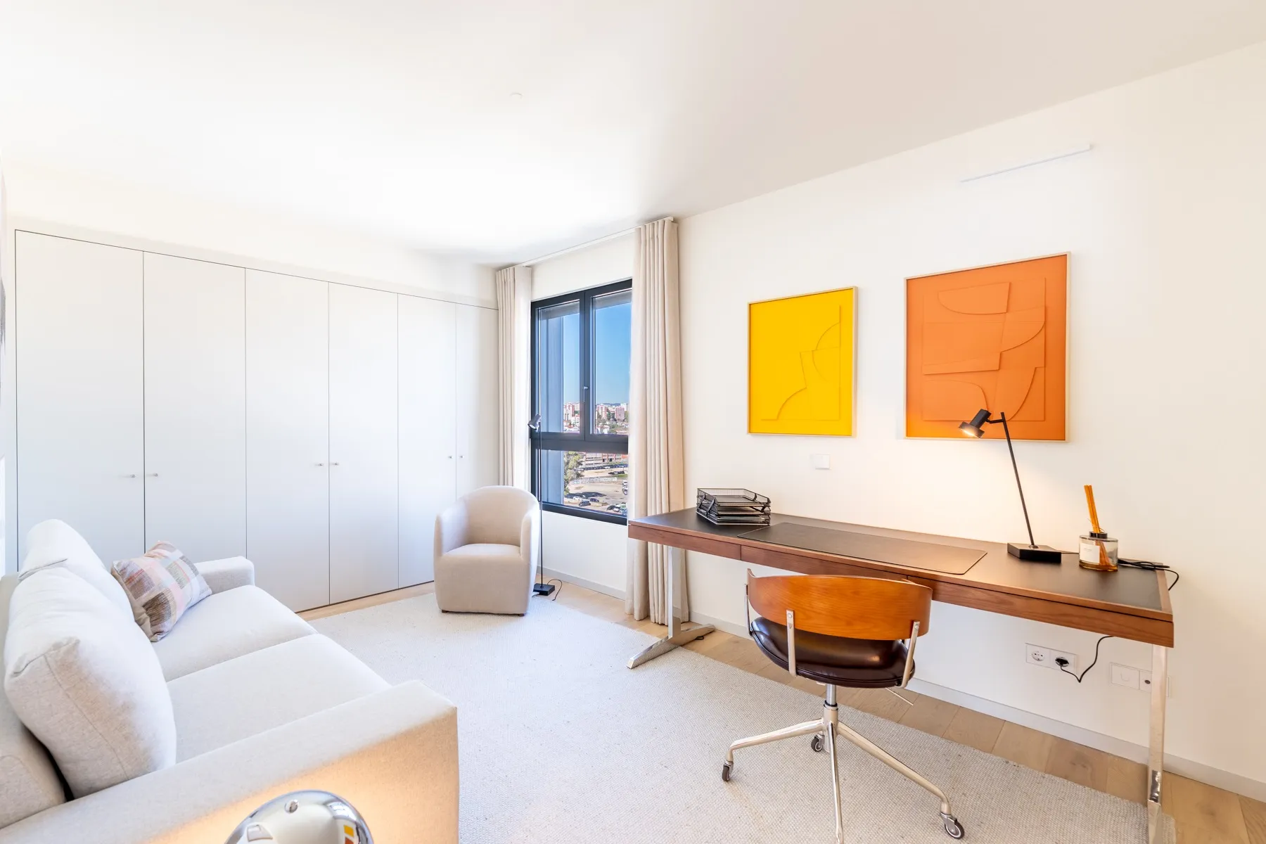 Flexible second bedroom with sofa bed workspace and fitted wardrobes