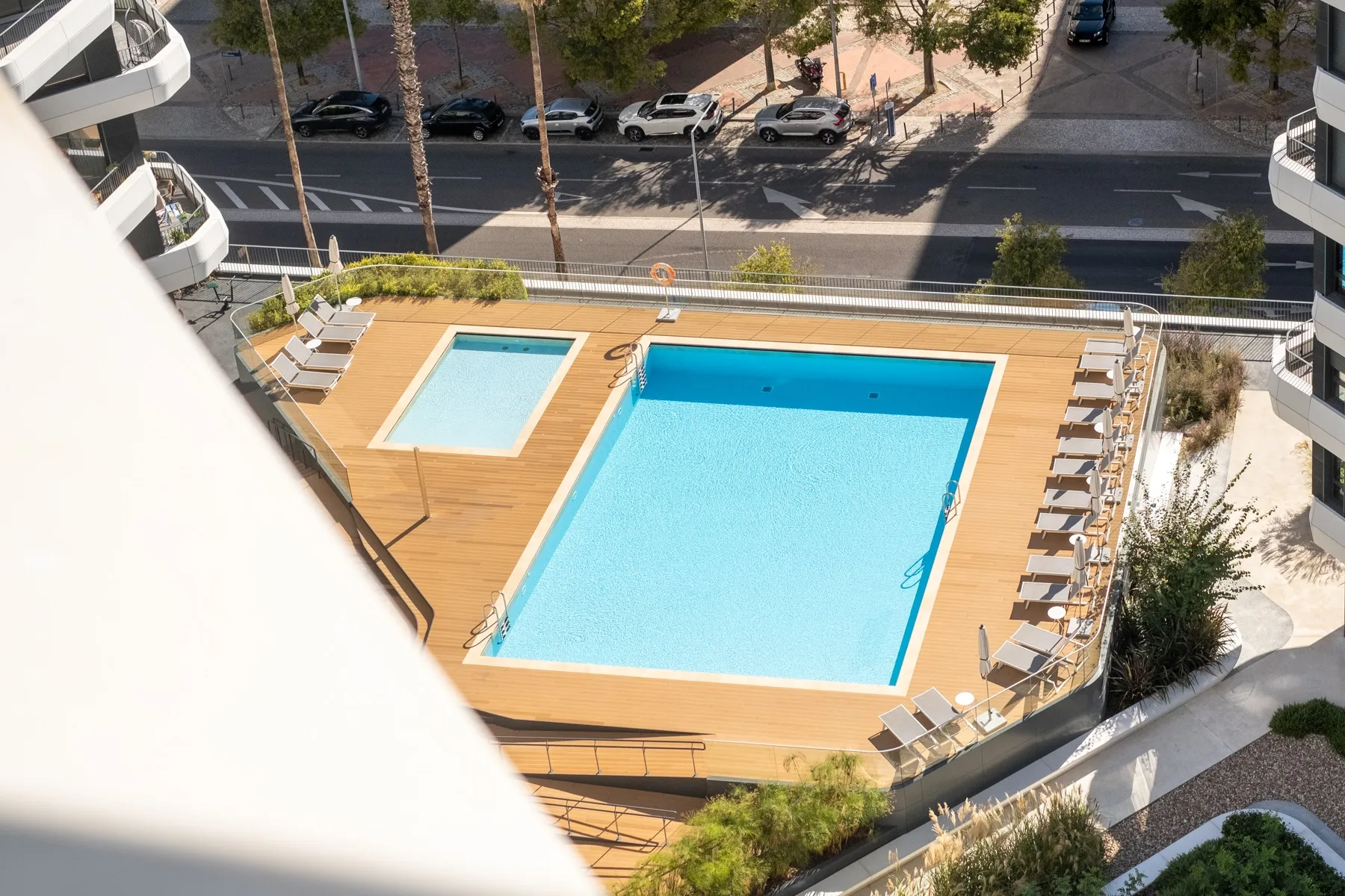 Landscaped condominium swimming pool viewed from the penthouse
