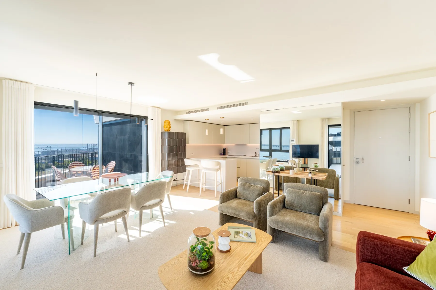 Bright reception room connecting the lounge dining area and kitchen
