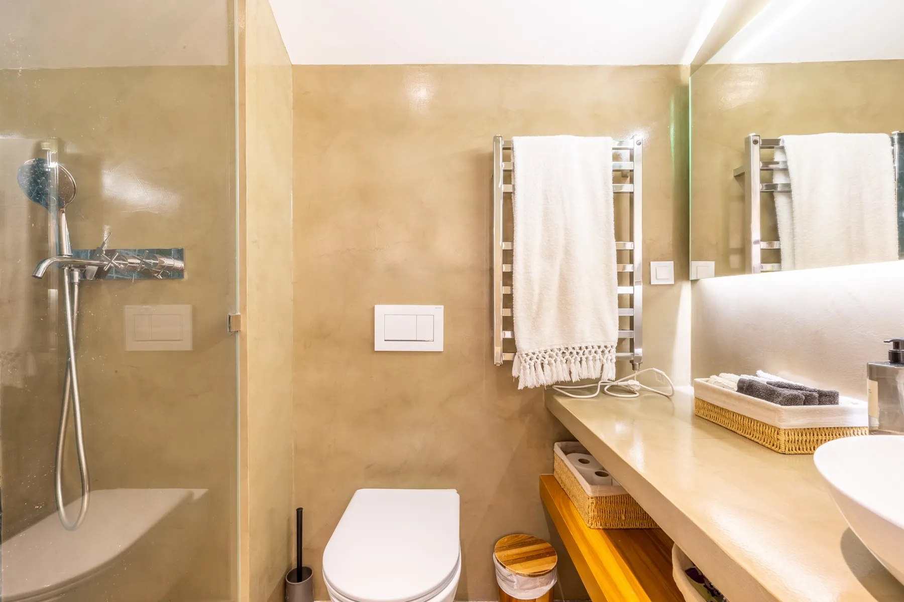 Walk-in shower and vanity in the contemporary guest bathroom