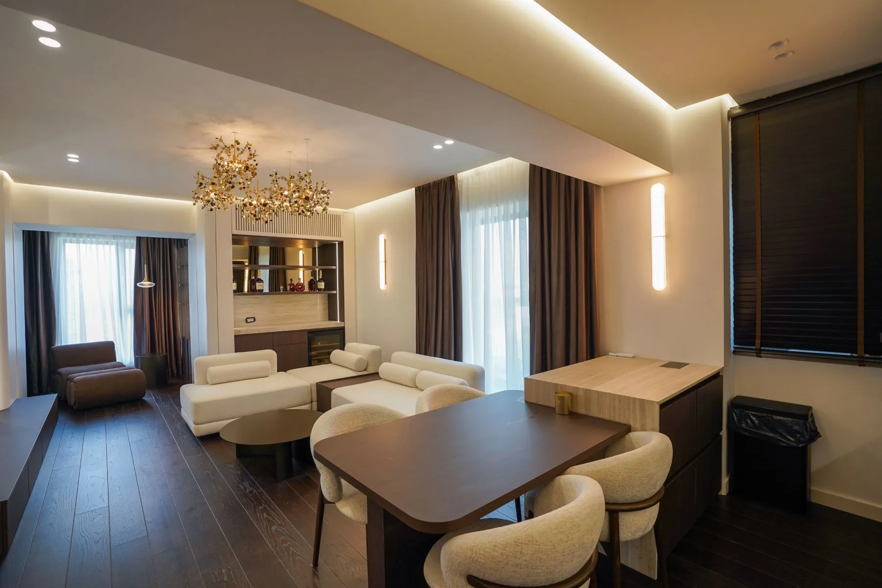 Elegant dining area connecting the bright lounge and private terrace doors
