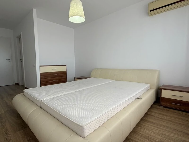 Double bedroom with bedside cabinets, air conditioning and natural light
