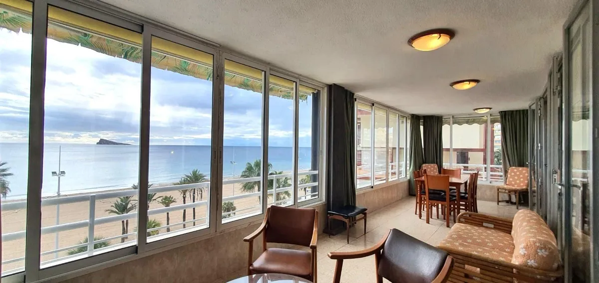 Panoramic enclosed balcony overlooking Levante Beach and the Mediterranean