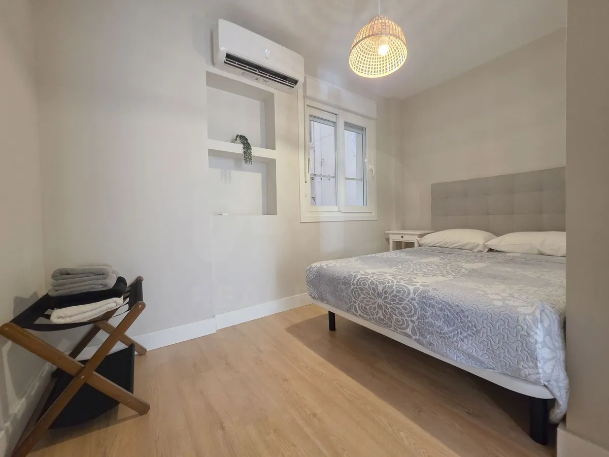 Second double bedroom with air conditioning and two windows