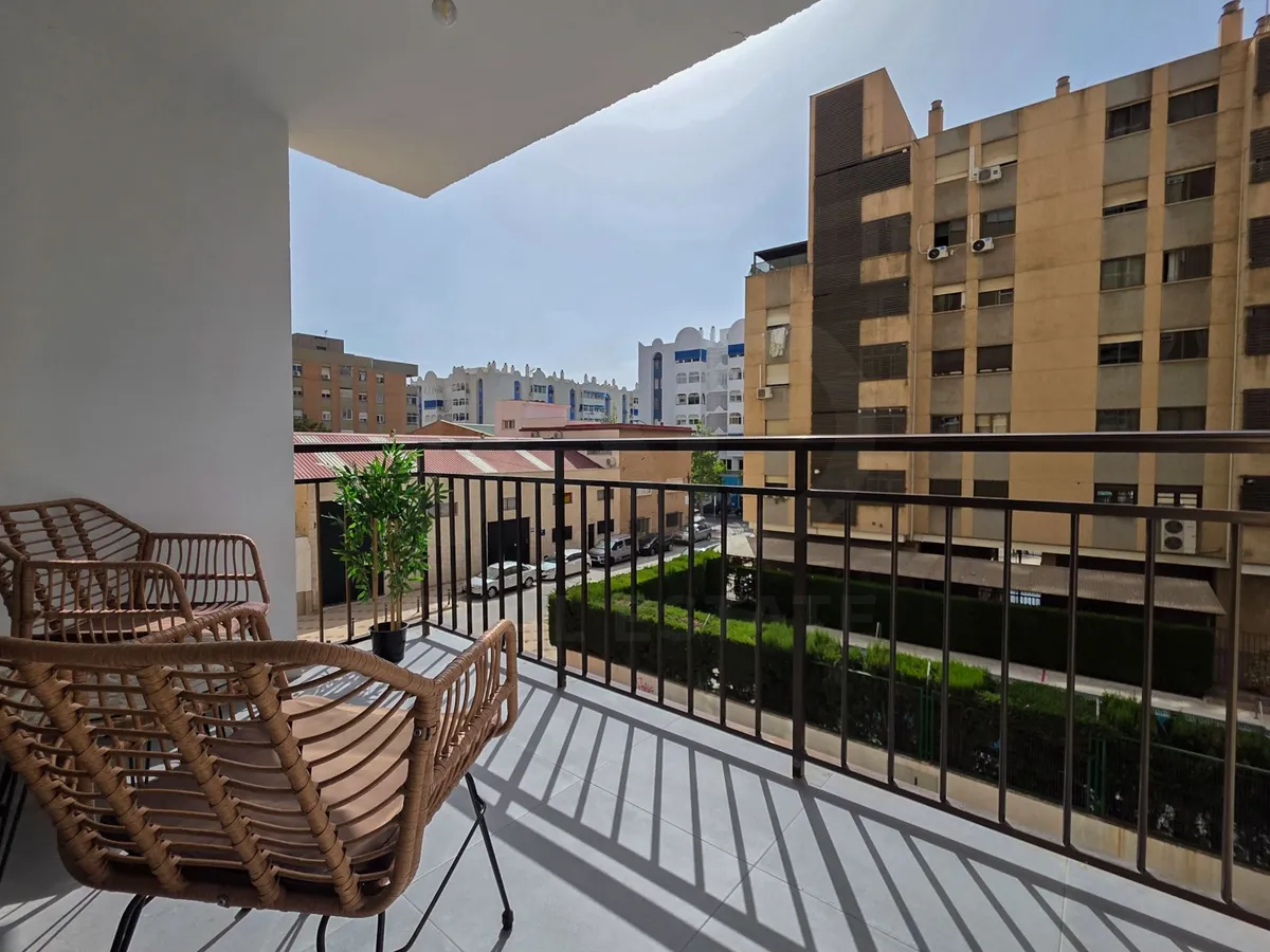 Terrace seating overlooking the surrounding Carretera de Cádiz neighbourhood
