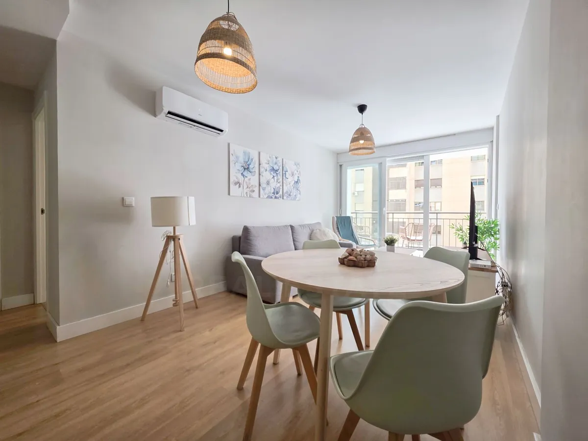 Dining table and lounge with direct access to the sunny terrace