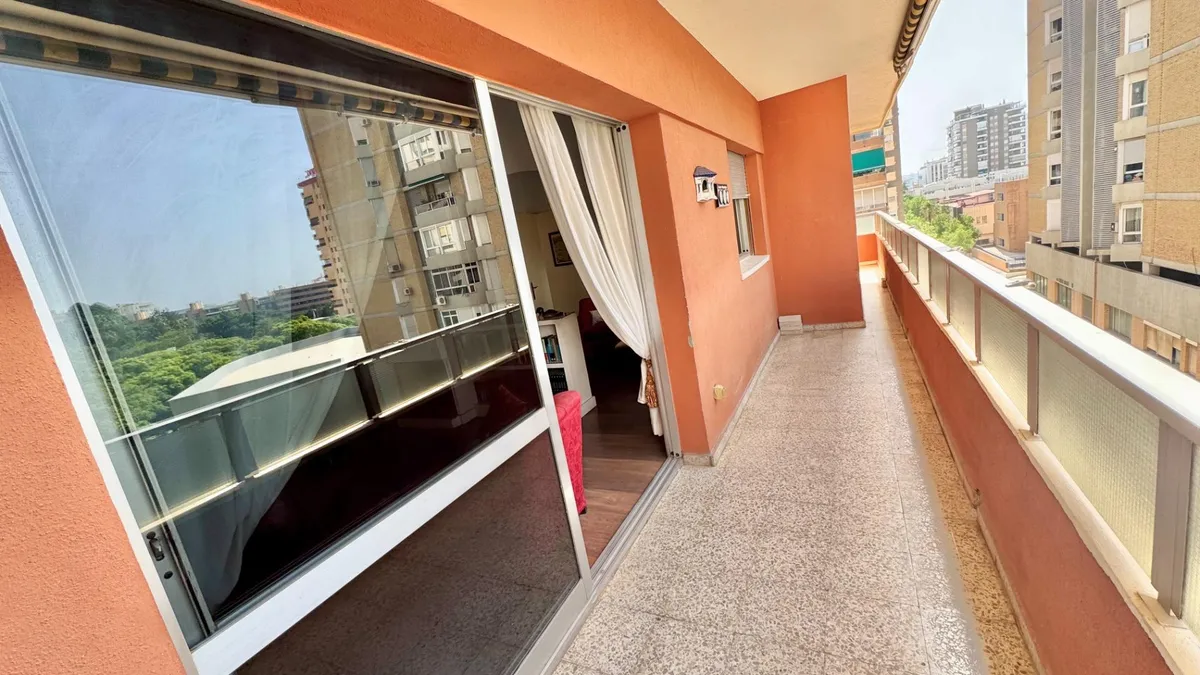 Long private balcony overlooking the Pasaje Esperanto neighbourhood