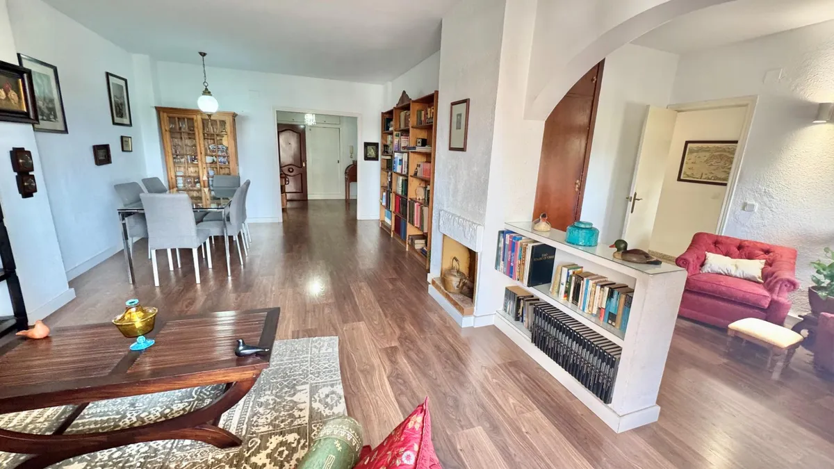 Long main living room connecting the dining area, lounge and entrance hall