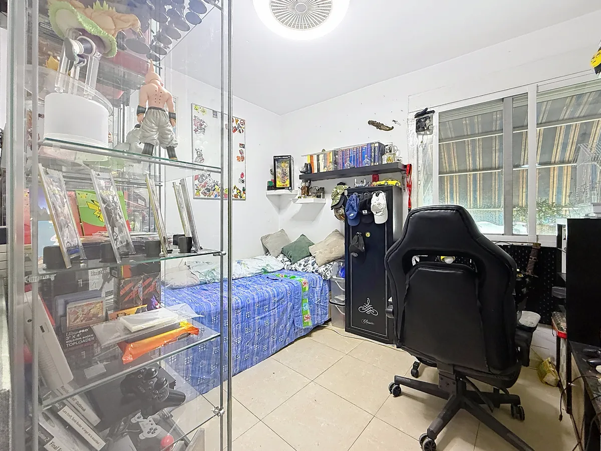 Flexible third bedroom and study with desk, storage and exterior window