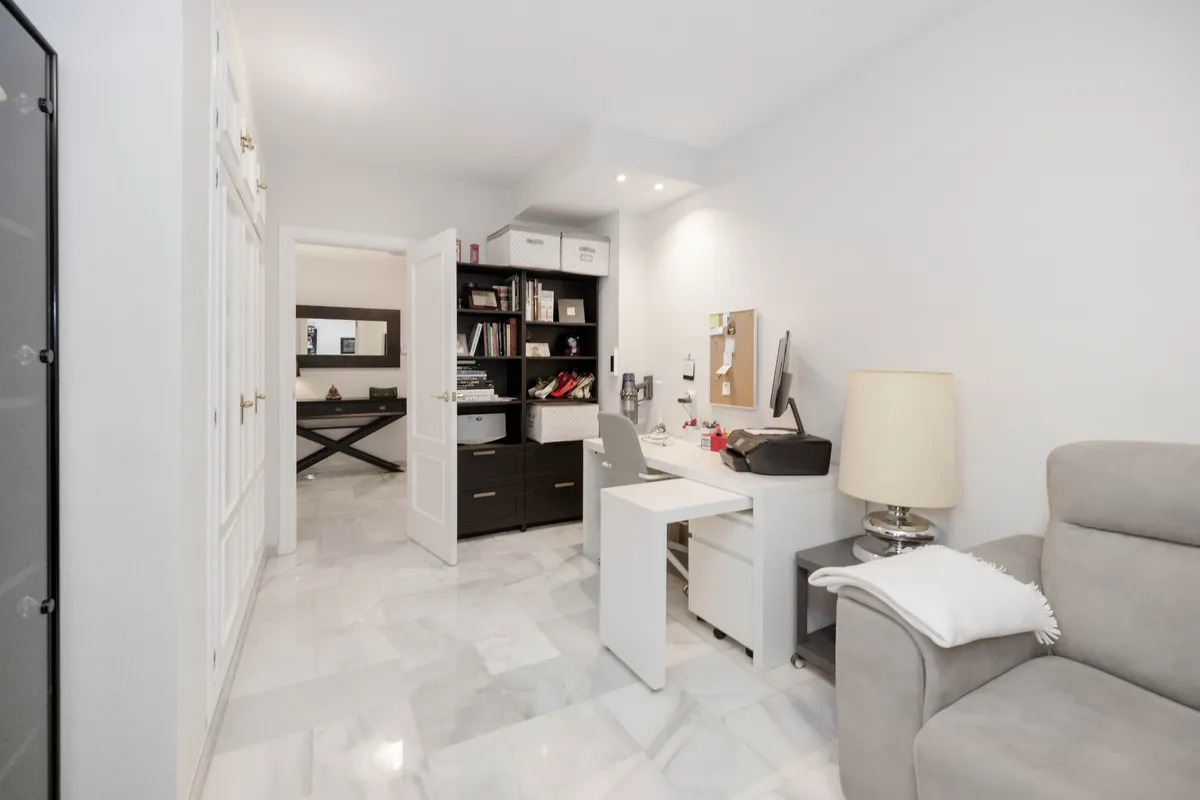 Elegant entrance hall with console table and large wall mirror