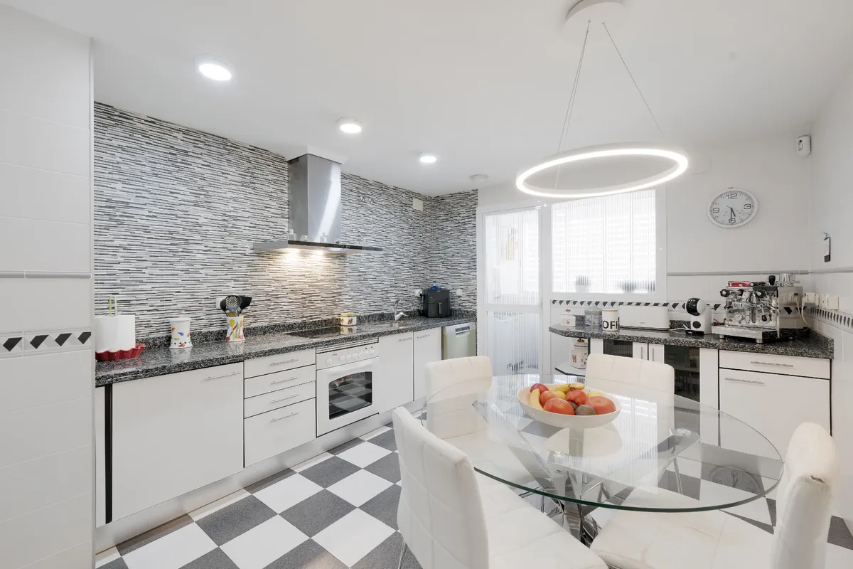 Granite kitchen counters with hob, oven and generous preparation space