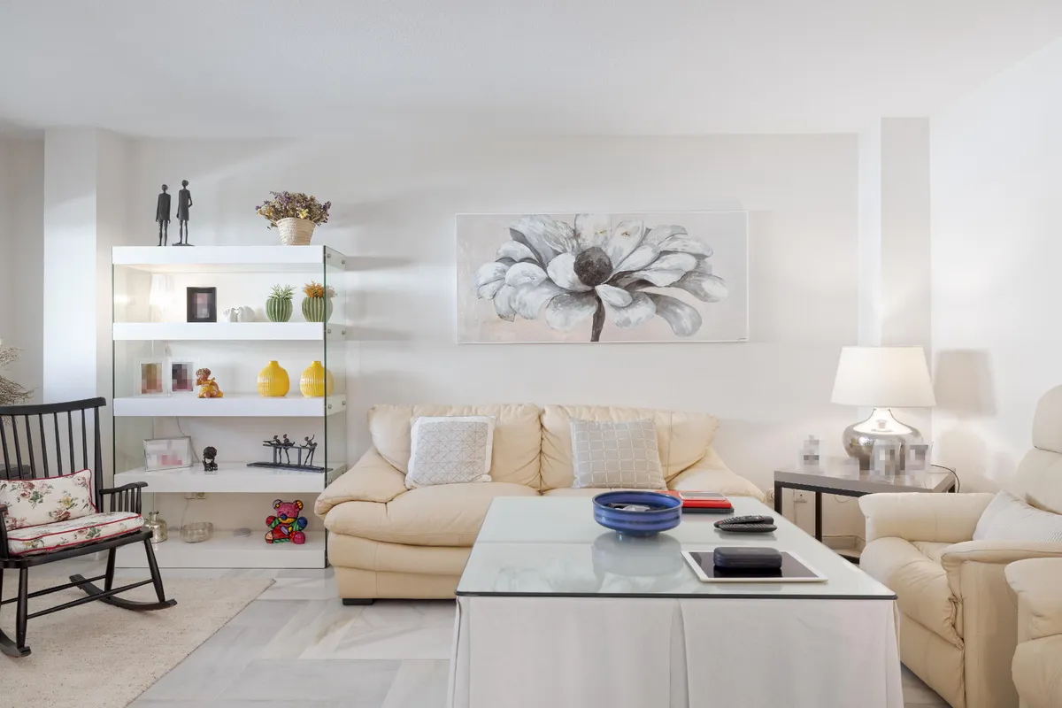 Comfortable principal living room arranged around a central coffee table