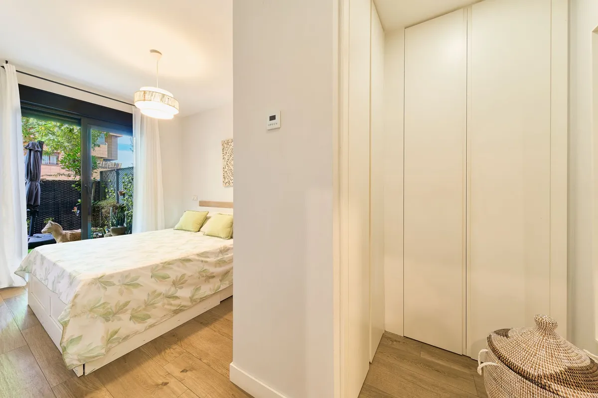 Principal bedroom entrance with full-height fitted wardrobes