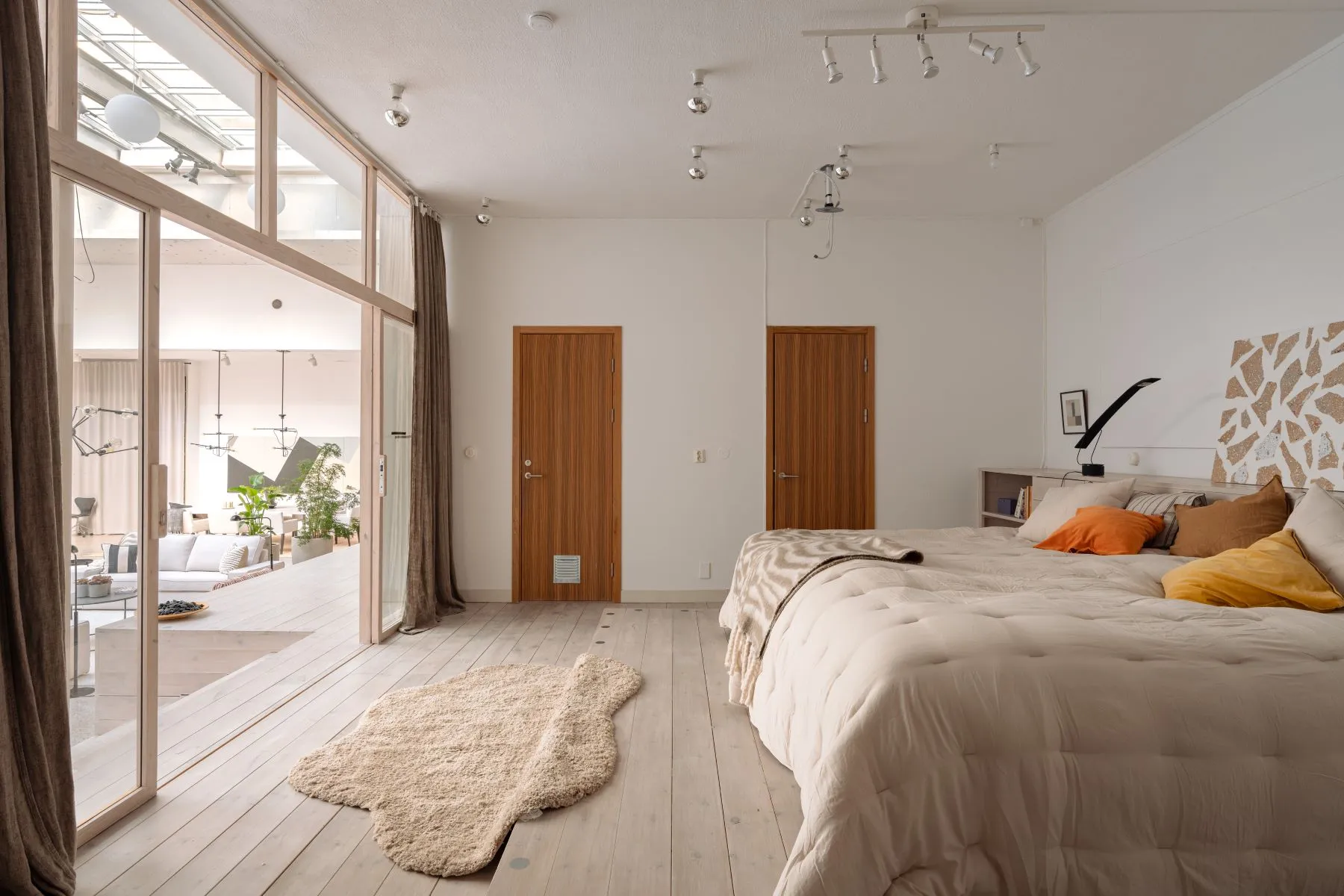 Spacious double bedroom with direct access to the private inner courtyard area