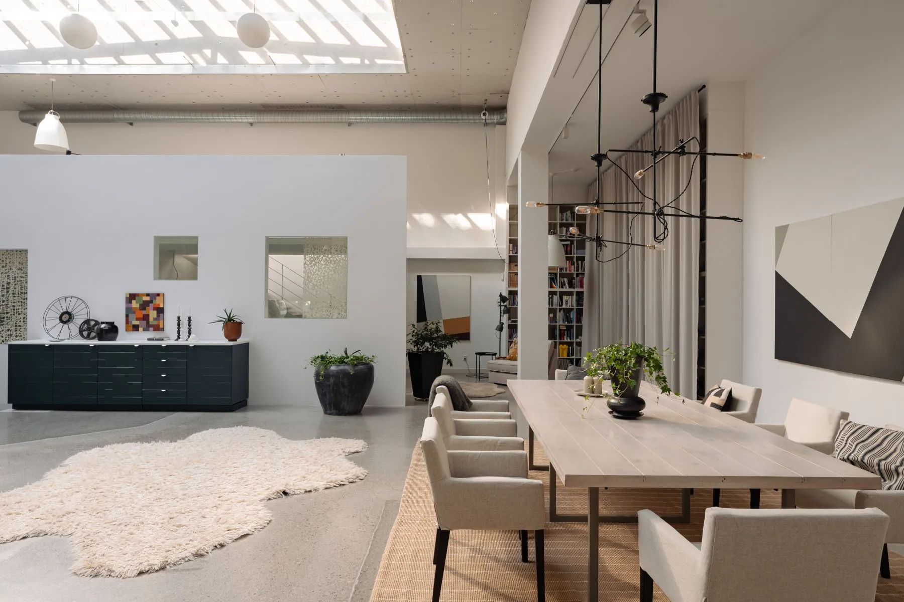 Dining area at the edge of the open-plan former cinema living room