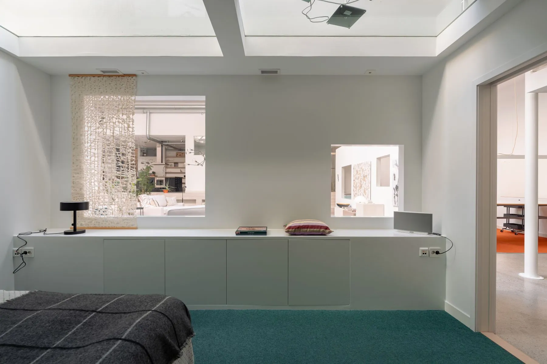 Quiet private room with integrated storage and clerestory daylight