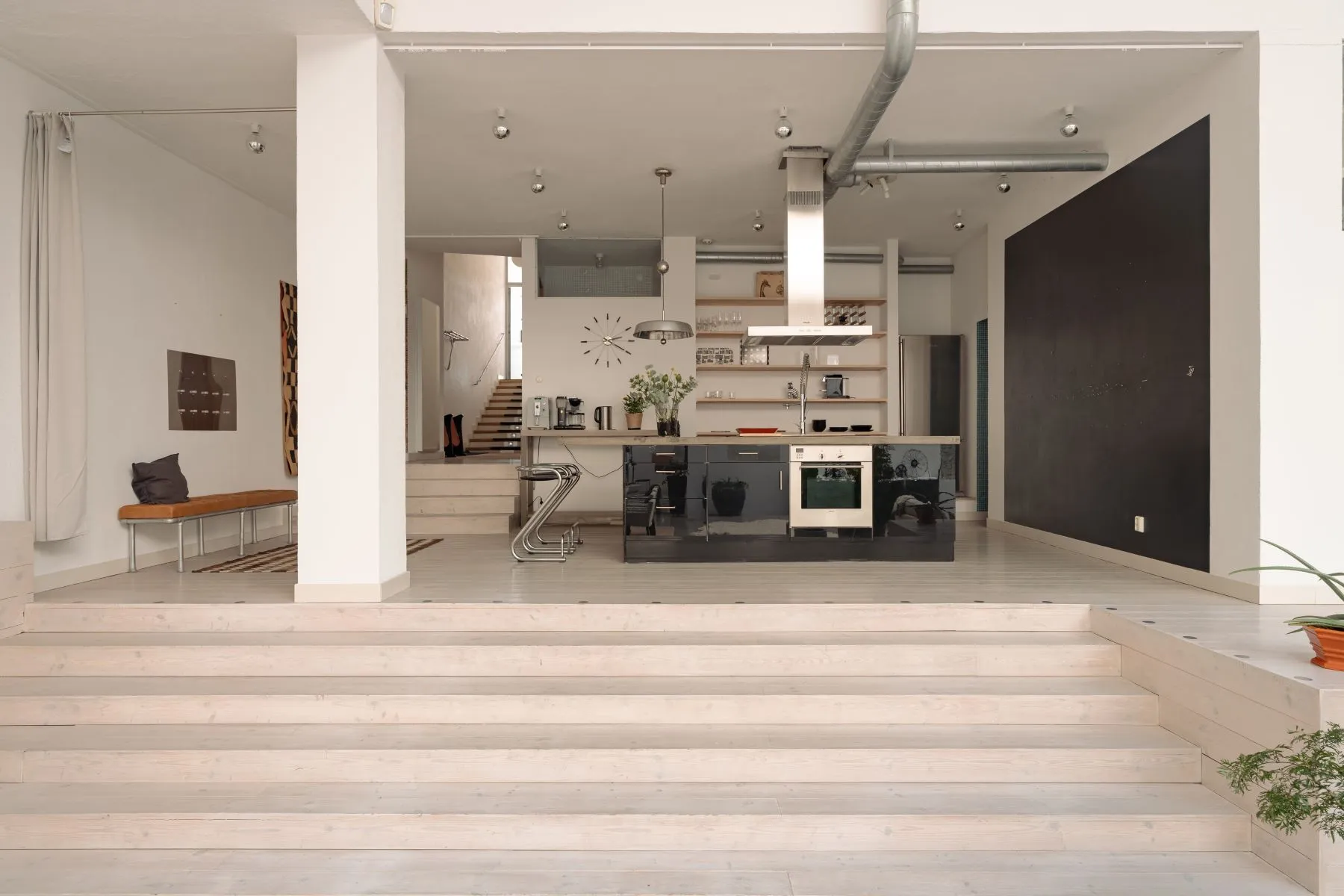Raised kitchen level overlooking the extraordinary main reception room