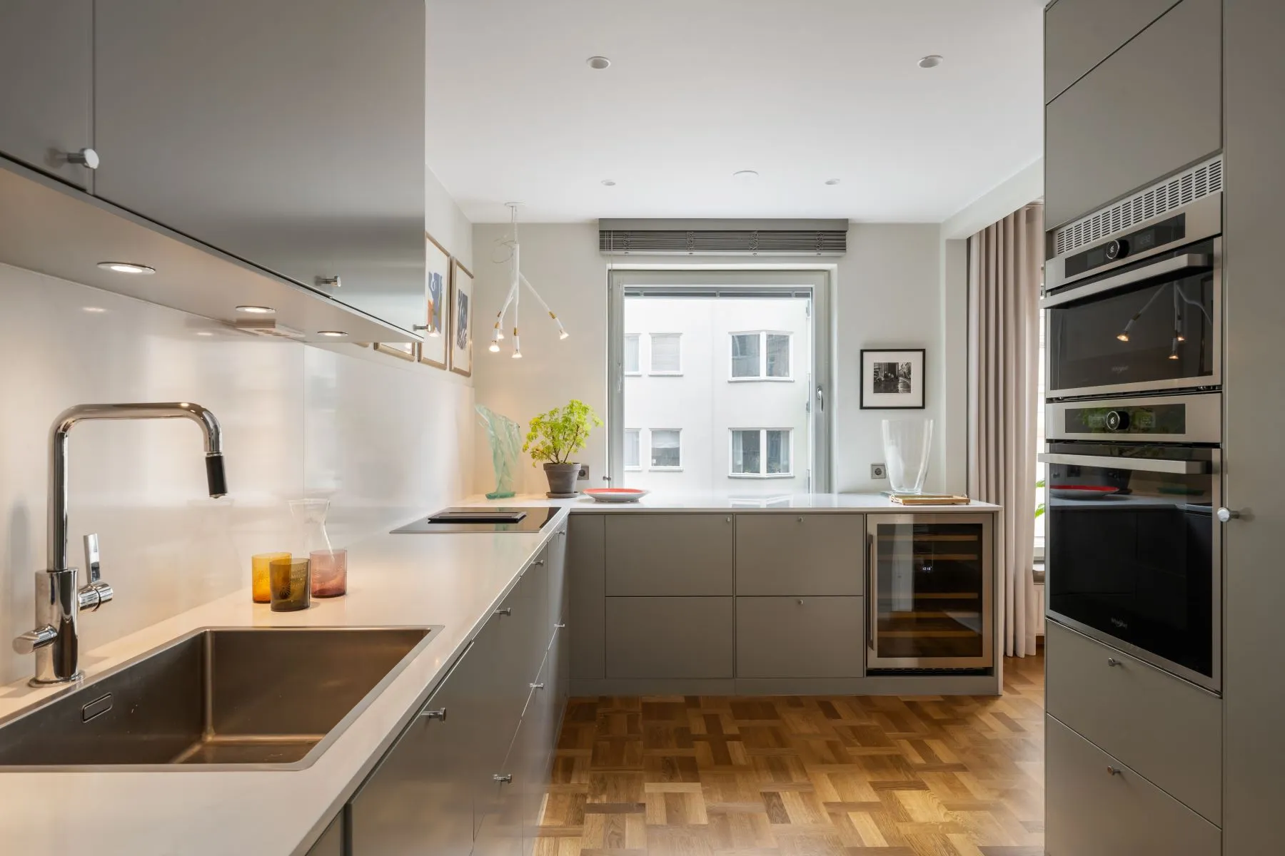 Premium grey Ballingslöv kitchen with integrated appliances and composite worktops