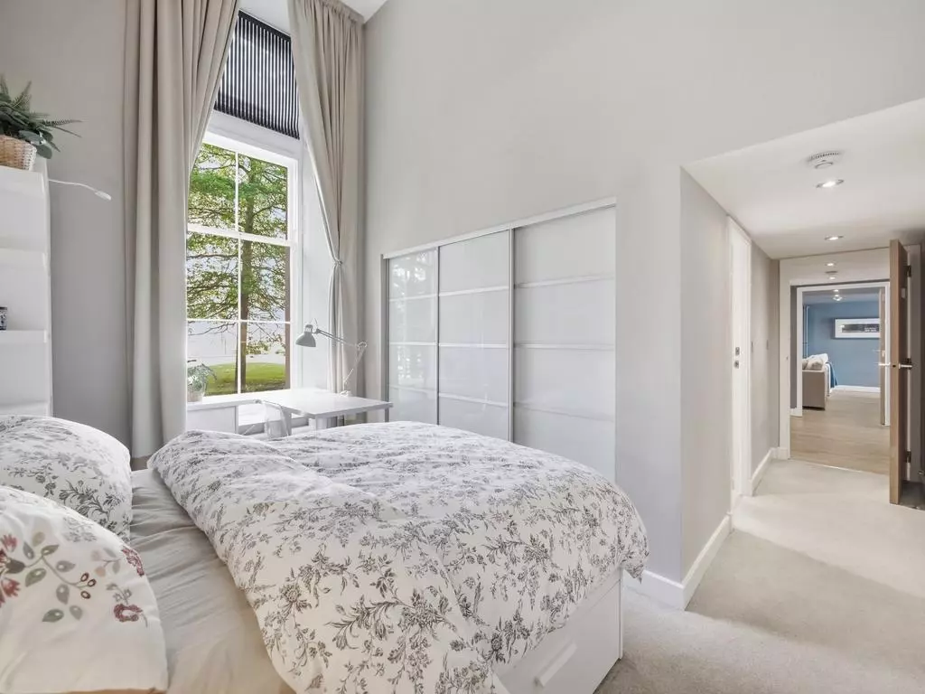 Second double bedroom with wardrobe and hallway access