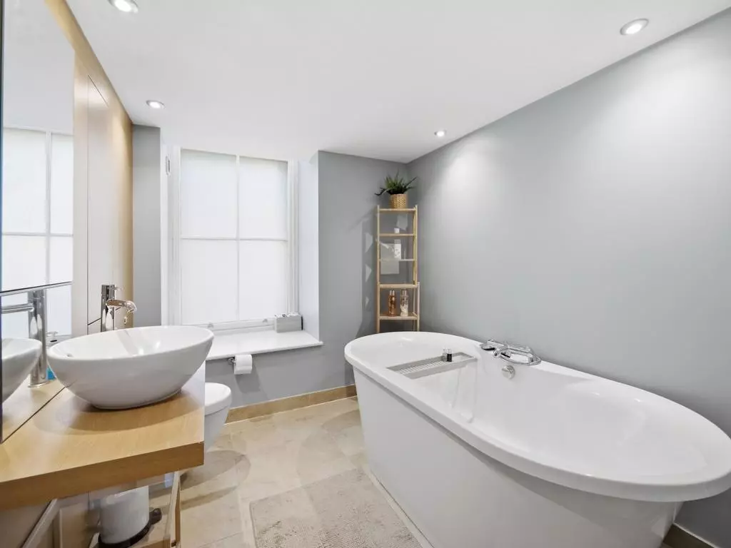 Contemporary bathroom with freestanding bathtub and separate shower