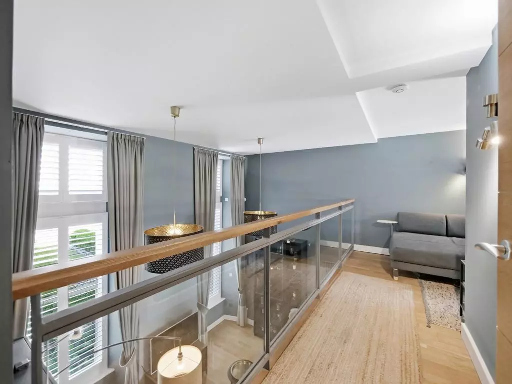 Mezzanine study and relaxation area above the living room