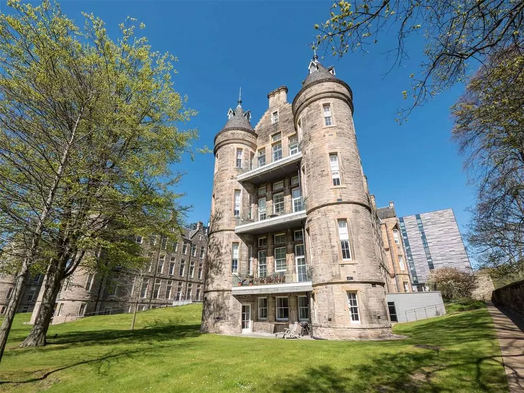 Historic Quartermile building beside landscaped grounds