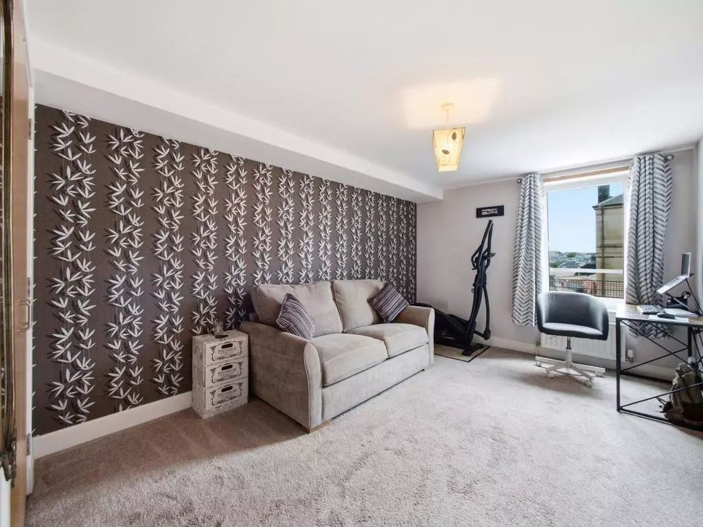 Second double bedroom with sofa bed and dedicated workspace