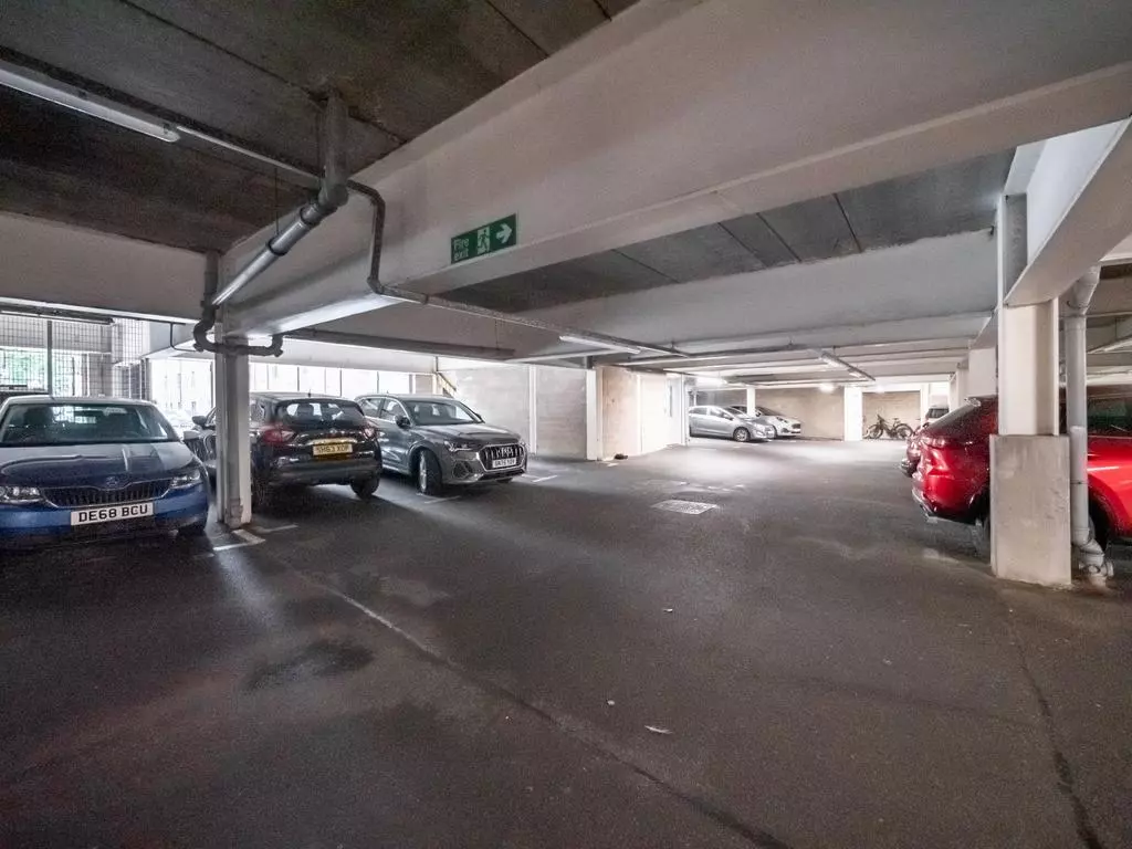 Secure residents parking beneath the apartment development