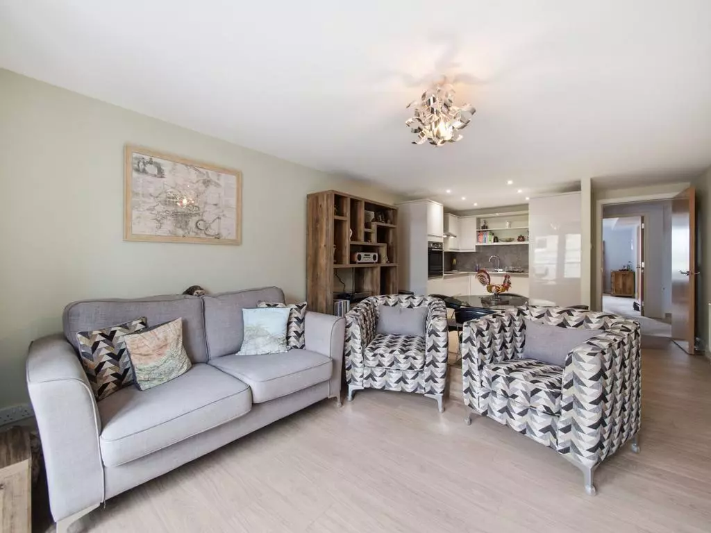 Comfortable living area with sofa seating and contemporary decor