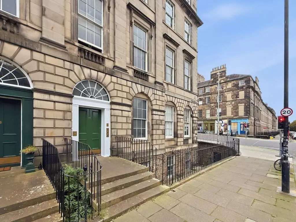 Stone entrance frontage of the Great King Street apartment building