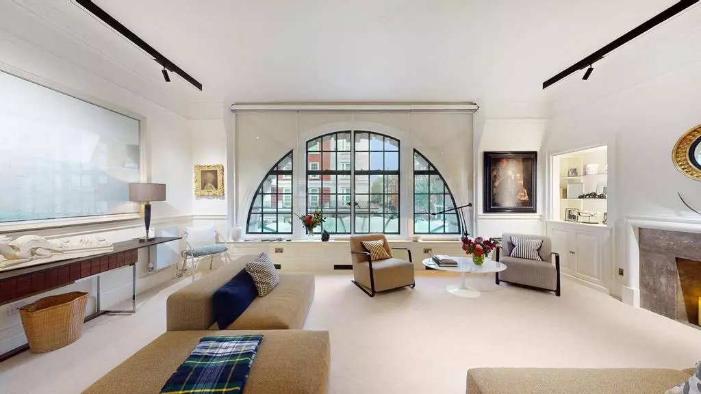 Chiltern Court reception room with oversized arched window and elegant seating