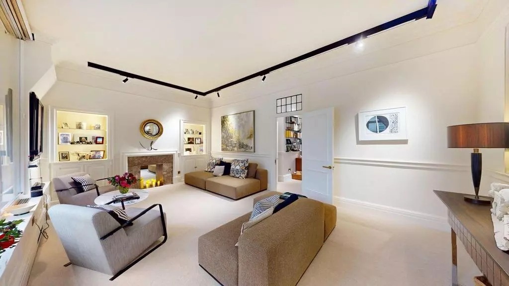 Reception and dining room with layered seating and architectural detailing